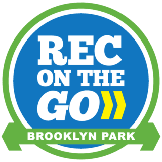 A circular logo with the text "REC ON THE GO" in white on a blue background, two yellow arrows, and "BROOKLYN PARK" on a green ribbon at the bottom.